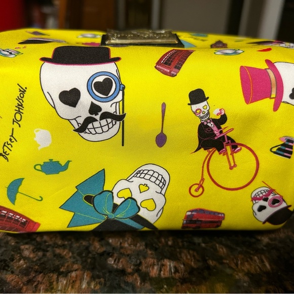 NWOT Betsey Johnson makeup travel bag in vibrant yellow with skull design. - Picture 3 of 10
